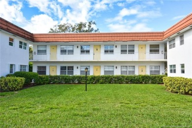 This first floor one bedroom, corner location with one and a on Pine Lakes Golf Club in Florida - for sale on GolfHomes.com, golf home, golf lot