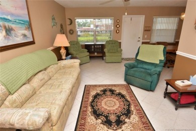 This first floor one bedroom, corner location with one and a on Pine Lakes Golf Club in Florida - for sale on GolfHomes.com, golf home, golf lot