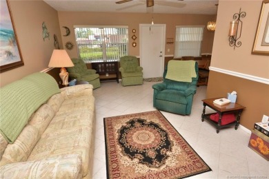 This first floor one bedroom, corner location with one and a on Pine Lakes Golf Club in Florida - for sale on GolfHomes.com, golf home, golf lot