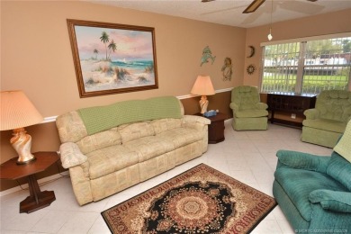 This first floor one bedroom, corner location with one and a on Pine Lakes Golf Club in Florida - for sale on GolfHomes.com, golf home, golf lot
