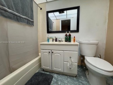 Spacious first-floor 2/2 unit is located in the gated on Inverrary Country Club in Florida - for sale on GolfHomes.com, golf home, golf lot
