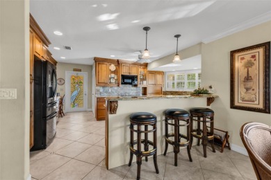 Experience luxury living in this SPACIOUS TURN-KEY 3 bedroom, 3 on Twin Isles Country Club in Florida - for sale on GolfHomes.com, golf home, golf lot