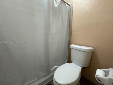Spacious first-floor 2/2 unit is located in the gated on Inverrary Country Club in Florida - for sale on GolfHomes.com, golf home, golf lot