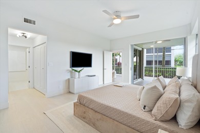 This light-filled first-floor condo has been completely on Polo Club of Boca Raton in Florida - for sale on GolfHomes.com, golf home, golf lot