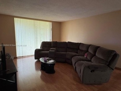 Spacious first-floor 2/2 unit is located in the gated on Inverrary Country Club in Florida - for sale on GolfHomes.com, golf home, golf lot