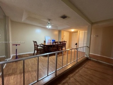 Spacious first-floor 2/2 unit is located in the gated on Inverrary Country Club in Florida - for sale on GolfHomes.com, golf home, golf lot