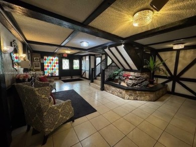 Spacious first-floor 2/2 unit is located in the gated on Inverrary Country Club in Florida - for sale on GolfHomes.com, golf home, golf lot