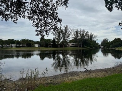 Spacious first-floor 2/2 unit is located in the gated on Inverrary Country Club in Florida - for sale on GolfHomes.com, golf home, golf lot