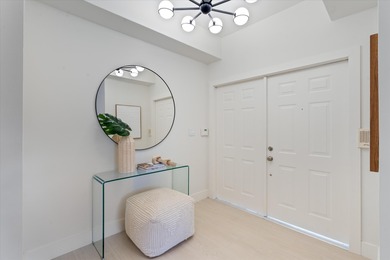 This light-filled first-floor condo has been completely on Polo Club of Boca Raton in Florida - for sale on GolfHomes.com, golf home, golf lot