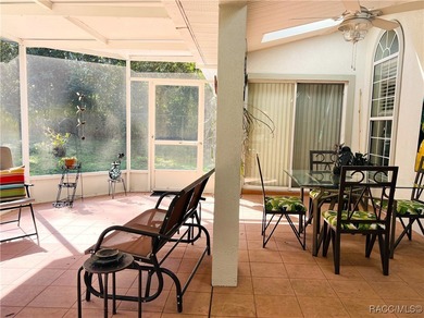 Charming three-bedroom, two-bathroom home featuring a two-car on Pine Ridge Community Golf and Country Club in Florida - for sale on GolfHomes.com, golf home, golf lot