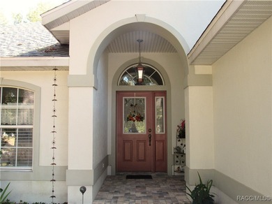 Charming three-bedroom, two-bathroom home featuring a two-car on Pine Ridge Community Golf and Country Club in Florida - for sale on GolfHomes.com, golf home, golf lot
