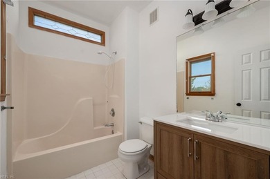 Welcome home to 5010 W Spoon Court, a charming retreat tucked in on Nags Head Golf Links in North Carolina - for sale on GolfHomes.com, golf home, golf lot