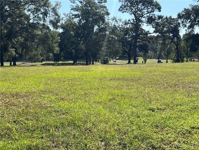 Charming three-bedroom, two-bathroom home featuring a two-car on Pine Ridge Community Golf and Country Club in Florida - for sale on GolfHomes.com, golf home, golf lot