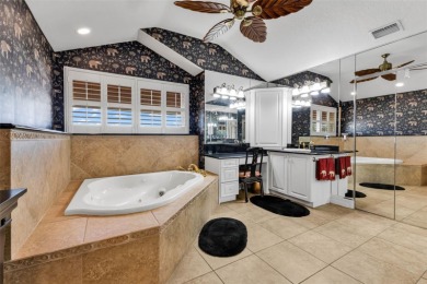 Experience luxury living in this SPACIOUS TURN-KEY 3 bedroom, 3 on Twin Isles Country Club in Florida - for sale on GolfHomes.com, golf home, golf lot