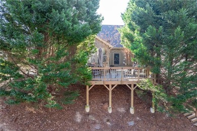 Welcome home to this beautifully custom built home by Ogilvie on The Highlands Course at Lake Arrowhead in Georgia - for sale on GolfHomes.com, golf home, golf lot