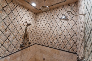 This Tuscan-style home, nestled in the Refuge golf course on The Refuge Golf and Country Club in Arizona - for sale on GolfHomes.com, golf home, golf lot