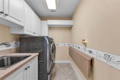 Experience luxury living in this SPACIOUS TURN-KEY 3 bedroom, 3 on Twin Isles Country Club in Florida - for sale on GolfHomes.com, golf home, golf lot