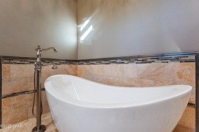 This Tuscan-style home, nestled in the Refuge golf course on The Refuge Golf and Country Club in Arizona - for sale on GolfHomes.com, golf home, golf lot