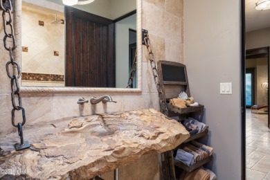 This Tuscan-style home, nestled in the Refuge golf course on The Refuge Golf and Country Club in Arizona - for sale on GolfHomes.com, golf home, golf lot