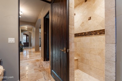 This Tuscan-style home, nestled in the Refuge golf course on The Refuge Golf and Country Club in Arizona - for sale on GolfHomes.com, golf home, golf lot