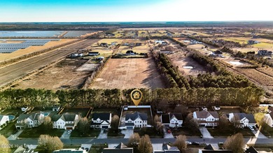 Bring the family to this spacious home featuring 6 bedrooms or 5 on Eagle Creek Golf Club and Grill in North Carolina - for sale on GolfHomes.com, golf home, golf lot