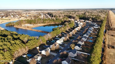 Bring the family to this spacious home featuring 6 bedrooms or 5 on Eagle Creek Golf Club and Grill in North Carolina - for sale on GolfHomes.com, golf home, golf lot