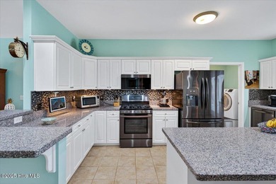 Welcome to a rare opportunity to own one of Oak Island's most on Founders Club At St. James Plantation in North Carolina - for sale on GolfHomes.com, golf home, golf lot