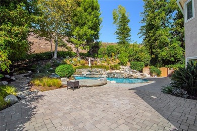 Experience elevated living in the highly sought-after Peacock on Lindero Country Club in California - for sale on GolfHomes.com, golf home, golf lot
