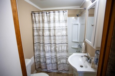 Cedar River Lodges are comprised of a Main Lodge, Guest Lodge on Cedar River Golf Course in New York - for sale on GolfHomes.com, golf home, golf lot