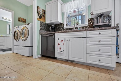 Welcome to a rare opportunity to own one of Oak Island's most on Founders Club At St. James Plantation in North Carolina - for sale on GolfHomes.com, golf home, golf lot