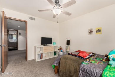 Step into this beautifully updated 4 bed/2.5 bath home in the on Dobson Ranch Municipal Golf Course in Arizona - for sale on GolfHomes.com, golf home, golf lot