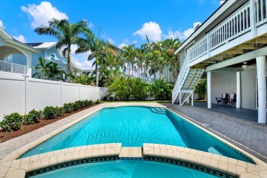 WELCOME TO THIS FABULOUS 3-STORY POOL HOME LOCATED IN THE on Pasadena Yacht and Country Club in Florida - for sale on GolfHomes.com, golf home, golf lot