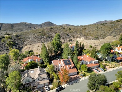 Experience elevated living in the highly sought-after Peacock on Lindero Country Club in California - for sale on GolfHomes.com, golf home, golf lot