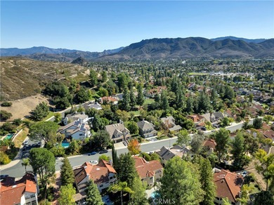 Experience elevated living in the highly sought-after Peacock on Lindero Country Club in California - for sale on GolfHomes.com, golf home, golf lot