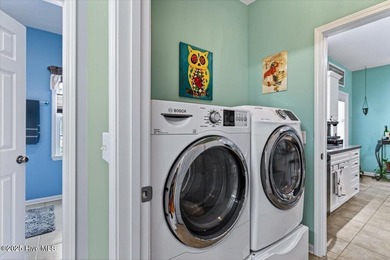 Welcome to a rare opportunity to own one of Oak Island's most on Founders Club At St. James Plantation in North Carolina - for sale on GolfHomes.com, golf home, golf lot