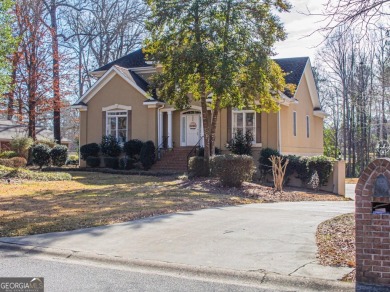 Discover the perfect blend of comfort and style in this on Landings Golf Club in Georgia - for sale on GolfHomes.com, golf home, golf lot