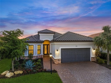 Water View, IMPACT GLASS WINDOWS  DOORS, and fully-loaded with on Esplanade Golf and Country at Lakewood Ranch in Florida - for sale on GolfHomes.com, golf home, golf lot