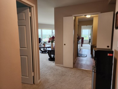 5000 Town Center living is a lifestyle! Professional condo on Evergreen Hills Golf Course in Michigan - for sale on GolfHomes.com, golf home, golf lot