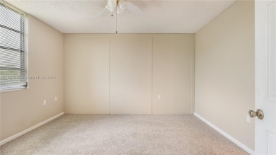 Stunning 2BR/2BA Corner Unit with Golf  Lake Views, Prime Davie on Pine Island Ridge Country Club in Florida - for sale on GolfHomes.com, golf home, golf lot