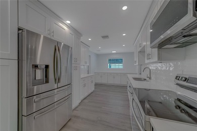 Welcome to 1152 Jackmar Rd, Dunedin, FL 34698, a beautifully on The Dunedin Country Club in Florida - for sale on GolfHomes.com, golf home, golf lot