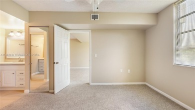 Stunning 2BR/2BA Corner Unit with Golf  Lake Views, Prime Davie on Pine Island Ridge Country Club in Florida - for sale on GolfHomes.com, golf home, golf lot
