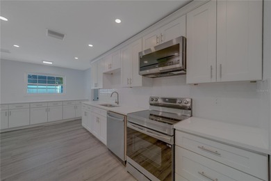 Welcome to 1152 Jackmar Rd, Dunedin, FL 34698, a beautifully on The Dunedin Country Club in Florida - for sale on GolfHomes.com, golf home, golf lot