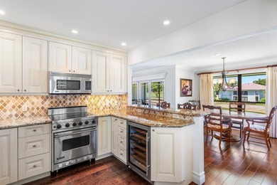 LUSH GOLF VIEWS & RESORT LIVING AT QUAIL RIDGE! Step into this on Quail Ridge Golf Course and Country Club in Florida - for sale on GolfHomes.com, golf home, golf lot