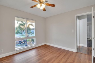 Wonderful second floor unit looking out on the water of the on The Glades Golf and Country Club in Florida - for sale on GolfHomes.com, golf home, golf lot