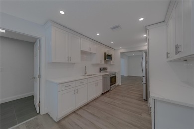 Welcome to 1152 Jackmar Rd, Dunedin, FL 34698, a beautifully on The Dunedin Country Club in Florida - for sale on GolfHomes.com, golf home, golf lot