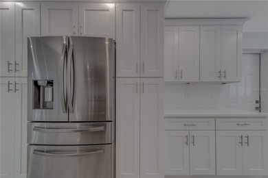 Welcome to 1152 Jackmar Rd, Dunedin, FL 34698, a beautifully on The Dunedin Country Club in Florida - for sale on GolfHomes.com, golf home, golf lot