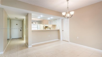 Stunning 2BR/2BA Corner Unit with Golf  Lake Views, Prime Davie on Pine Island Ridge Country Club in Florida - for sale on GolfHomes.com, golf home, golf lot