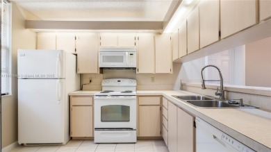 Stunning 2BR/2BA Corner Unit with Golf  Lake Views, Prime Davie on Pine Island Ridge Country Club in Florida - for sale on GolfHomes.com, golf home, golf lot