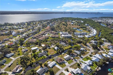 Completely remodeled and move-in ready, this beautiful river on Riverbend Golf and Country Club in Florida - for sale on GolfHomes.com, golf home, golf lot