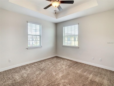 Come see this amazing corner unit townhouse in the sought after on Eagle Creek Golf Club in Florida - for sale on GolfHomes.com, golf home, golf lot